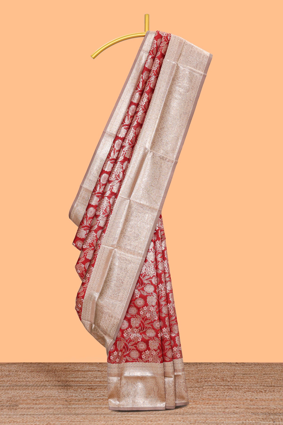 Red floral design art silk saree with contrast zari border and motifs blouse