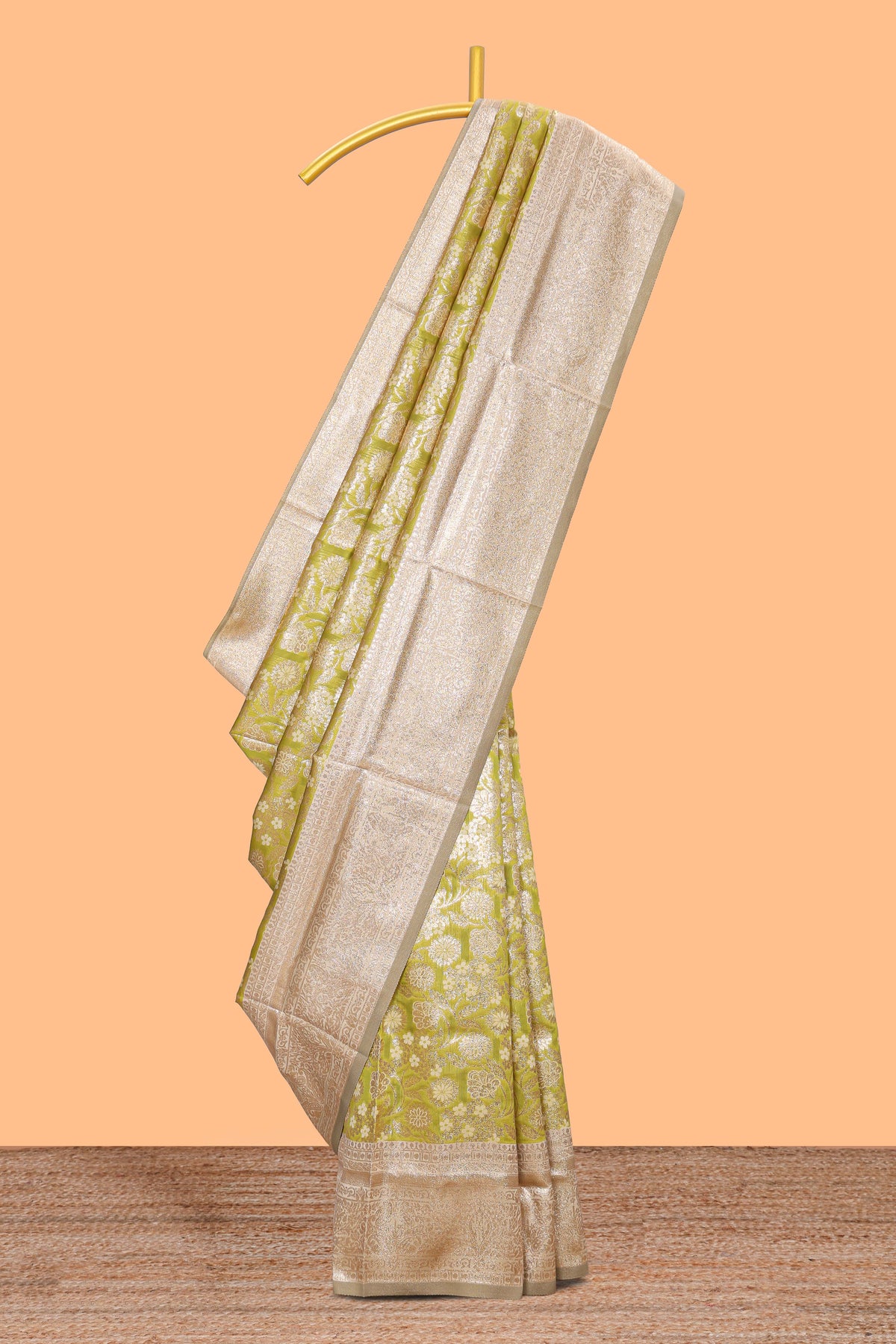 Green floral design art silk saree with contrast zari border and motifs blouse