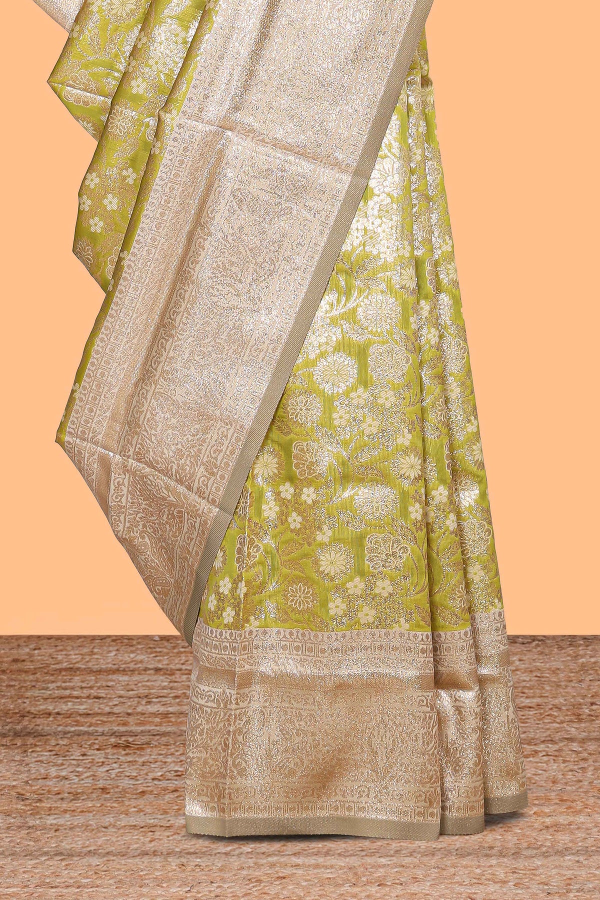 Green floral design art silk saree with contrast zari border and motifs blouse