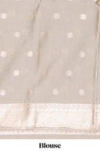 Green floral design art silk saree with contrast zari border and motifs blouse