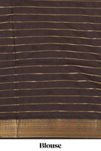 Teal blue checked art silk saree with contrast zari border and striped blouse
