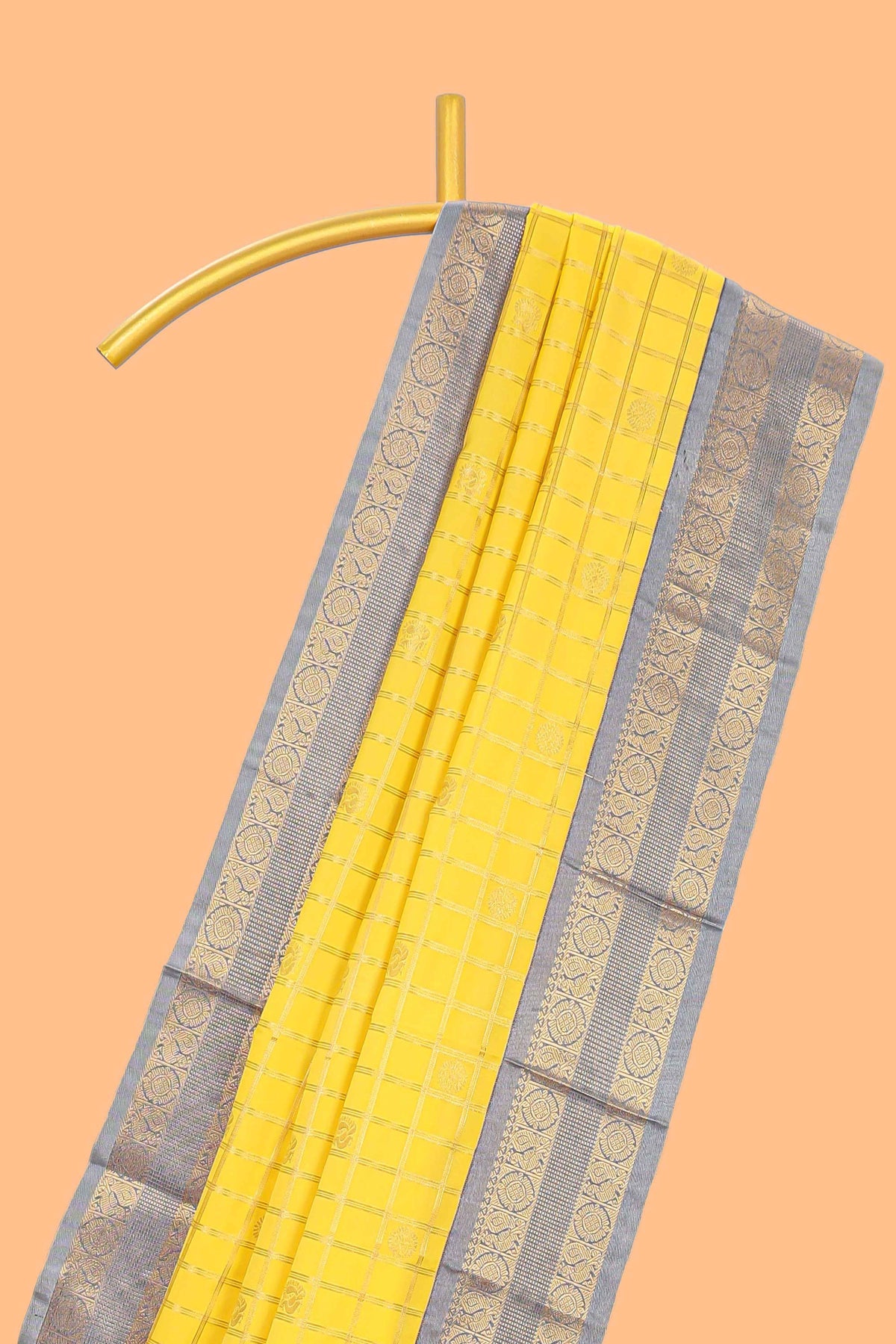 Yellow checked art silk saree with contrast zari border and blouse