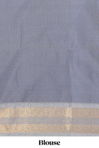 Yellow checked art silk saree with contrast zari border and blouse