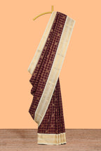 Brown checked art silk saree with contrast zari border and blouse