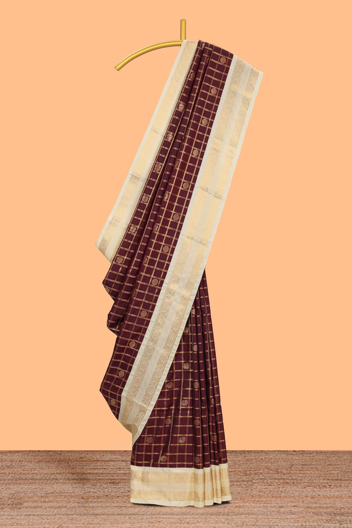 Brown checked art silk saree with contrast zari border and blouse