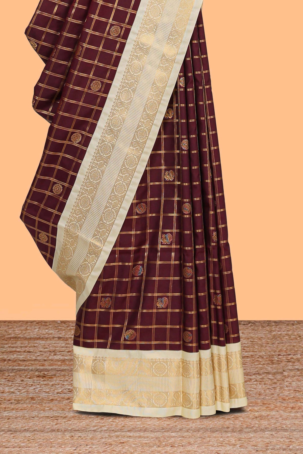 Brown checked art silk saree with contrast zari border and blouse