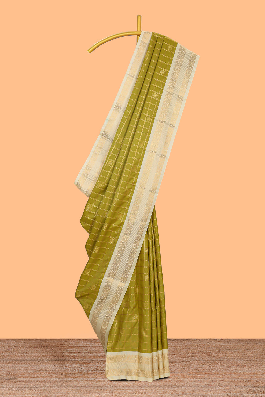 Green checked art silk saree with contrast zari border and blouse