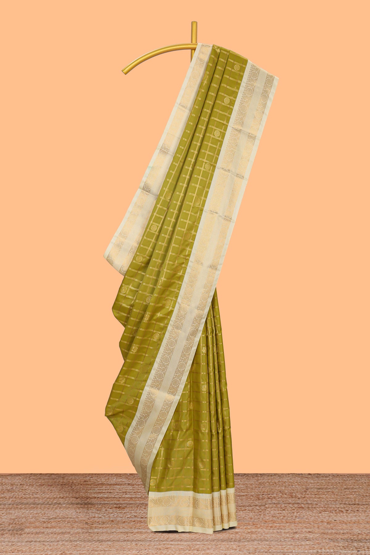 Green checked art silk saree with contrast zari border and blouse
