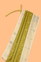 Green checked art silk saree with contrast zari border and blouse