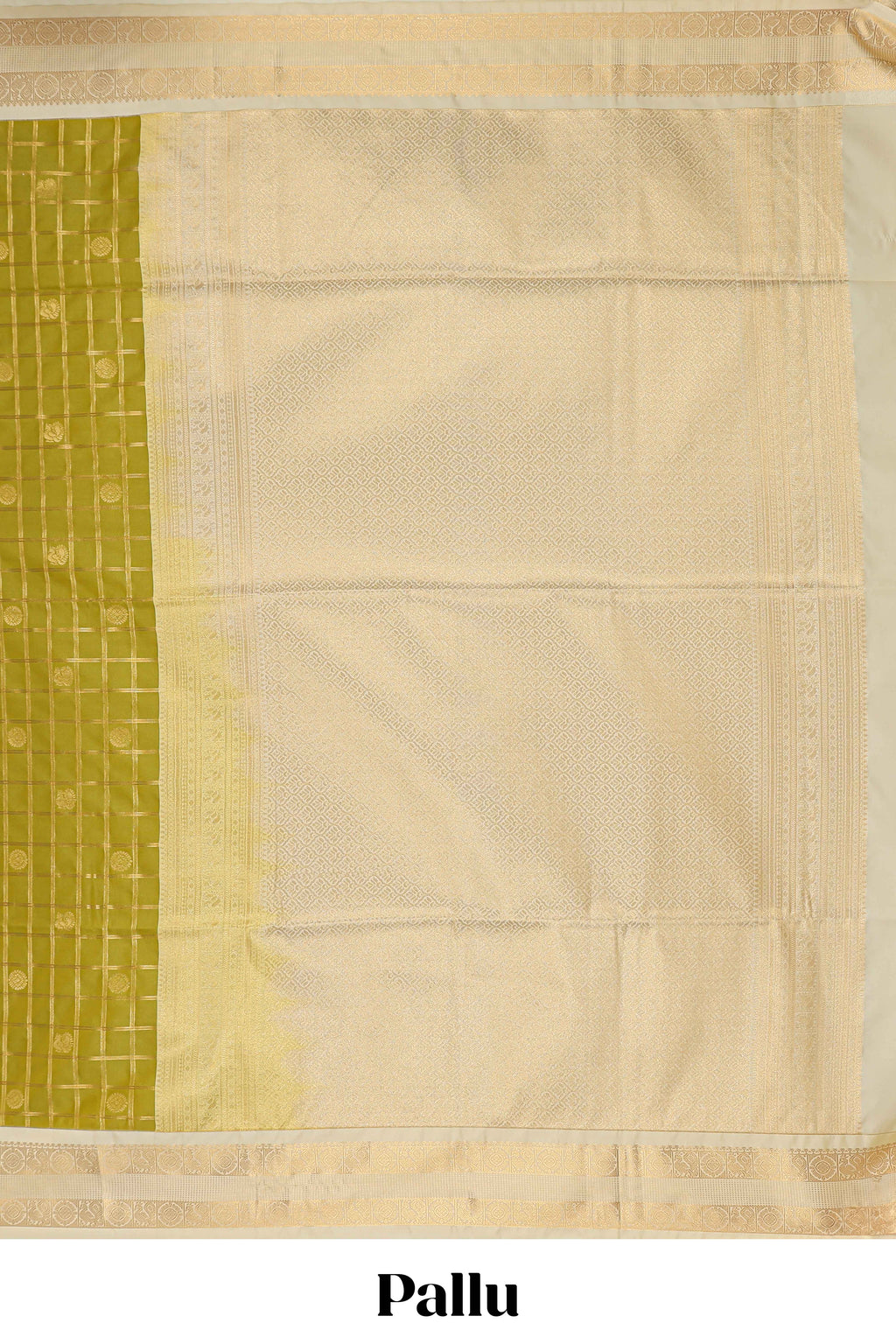 Green checked art silk saree with contrast zari border and blouse