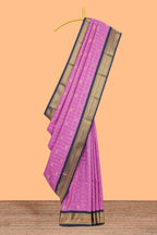 Pink checked art silk saree with contrast zari border and blouse