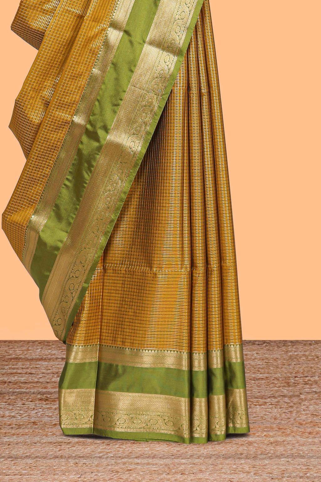 Mustard checked art silk saree with contrast zari border and blouse