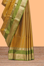 Mustard checked art silk saree with contrast zari border and blouse