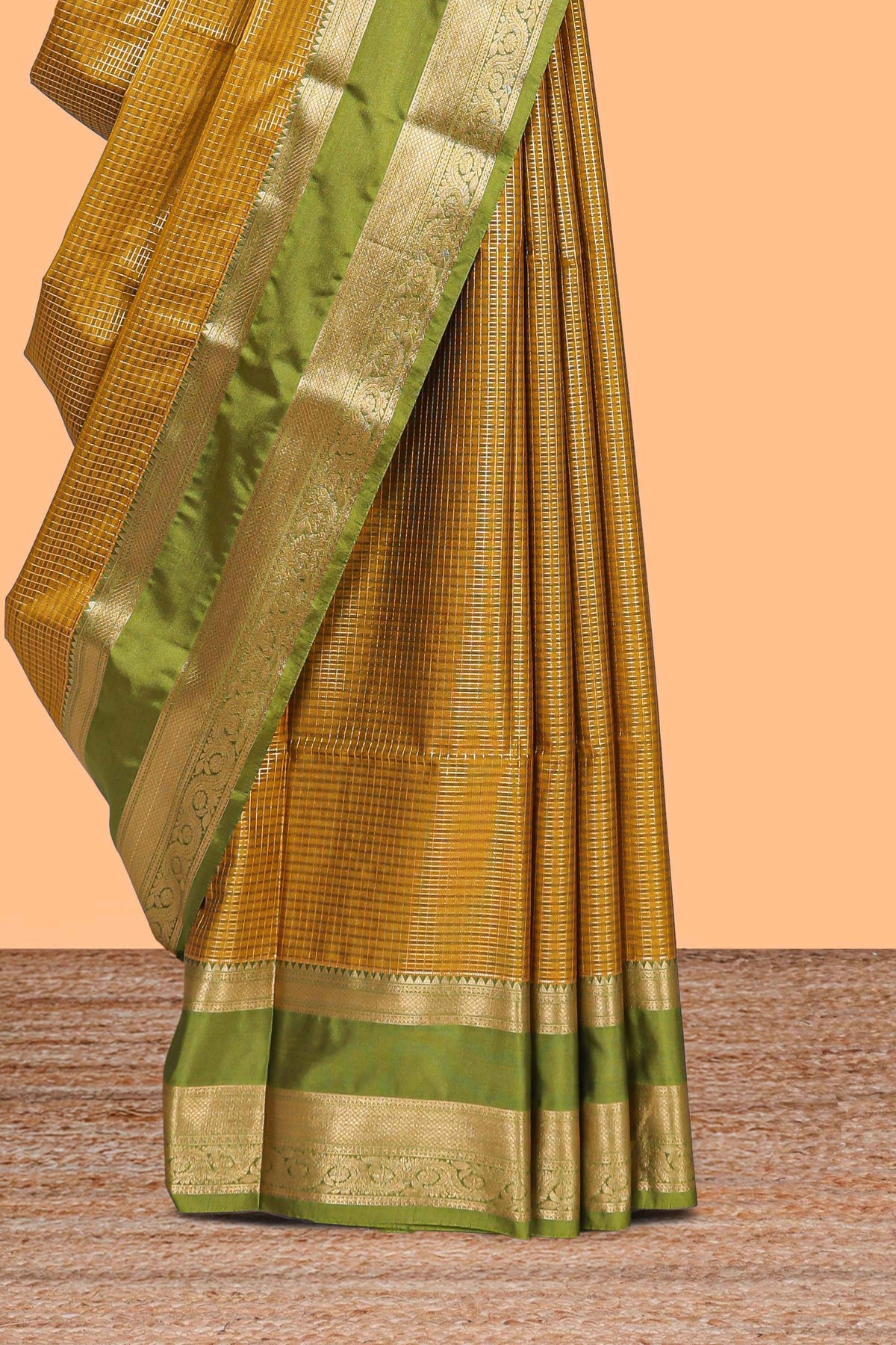 Mustard checked art silk saree with contrast zari border and blouse