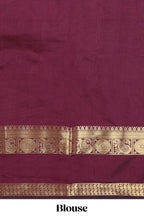 Maroon plain art silk saree with contrast self border and matching blouse