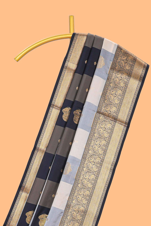 Black and white checked elephant motifs art silk saree with contrast self zari border and matching blouse