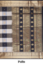 Black and white checked elephant motifs art silk saree with contrast self zari border and matching blouse