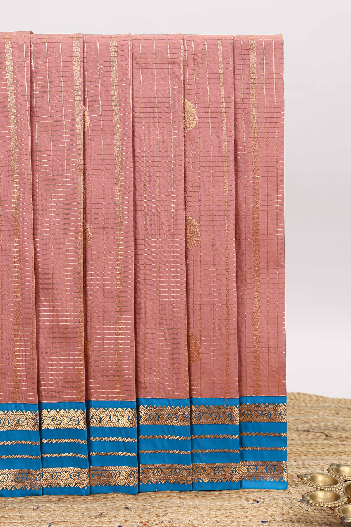 Peach checked zari motifs design art silk saree with contrast border and blouse