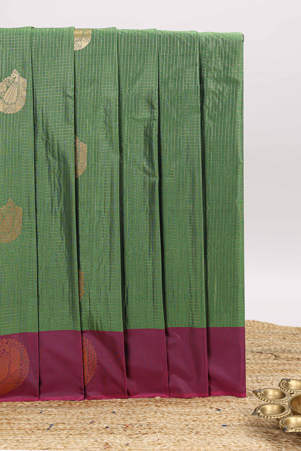 Green checked zari motifs design art silk saree with contrast border and blouse