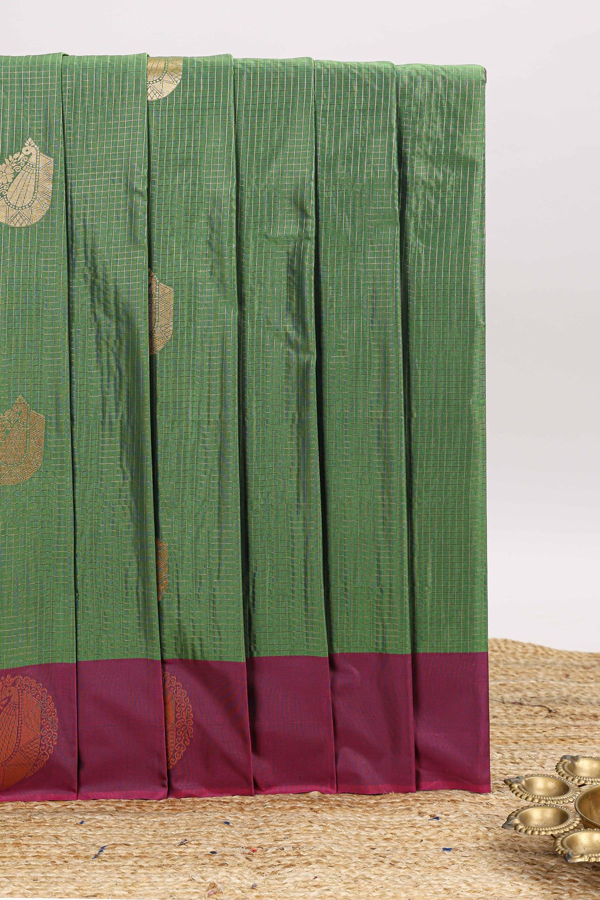 Green checked zari motifs design art silk saree with contrast border and blouse