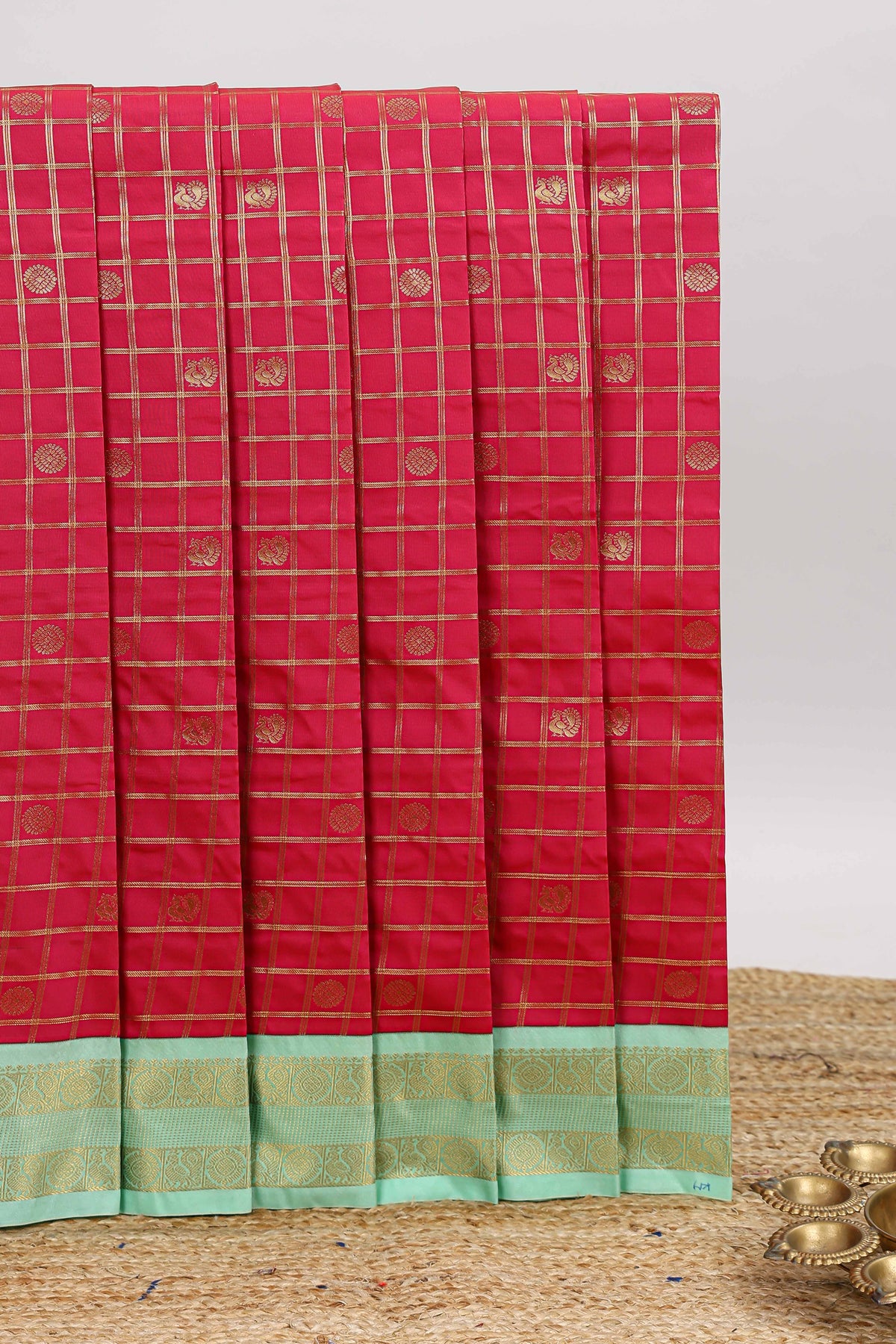 Red checked zari motifs design art silk saree with contrast border and blouse