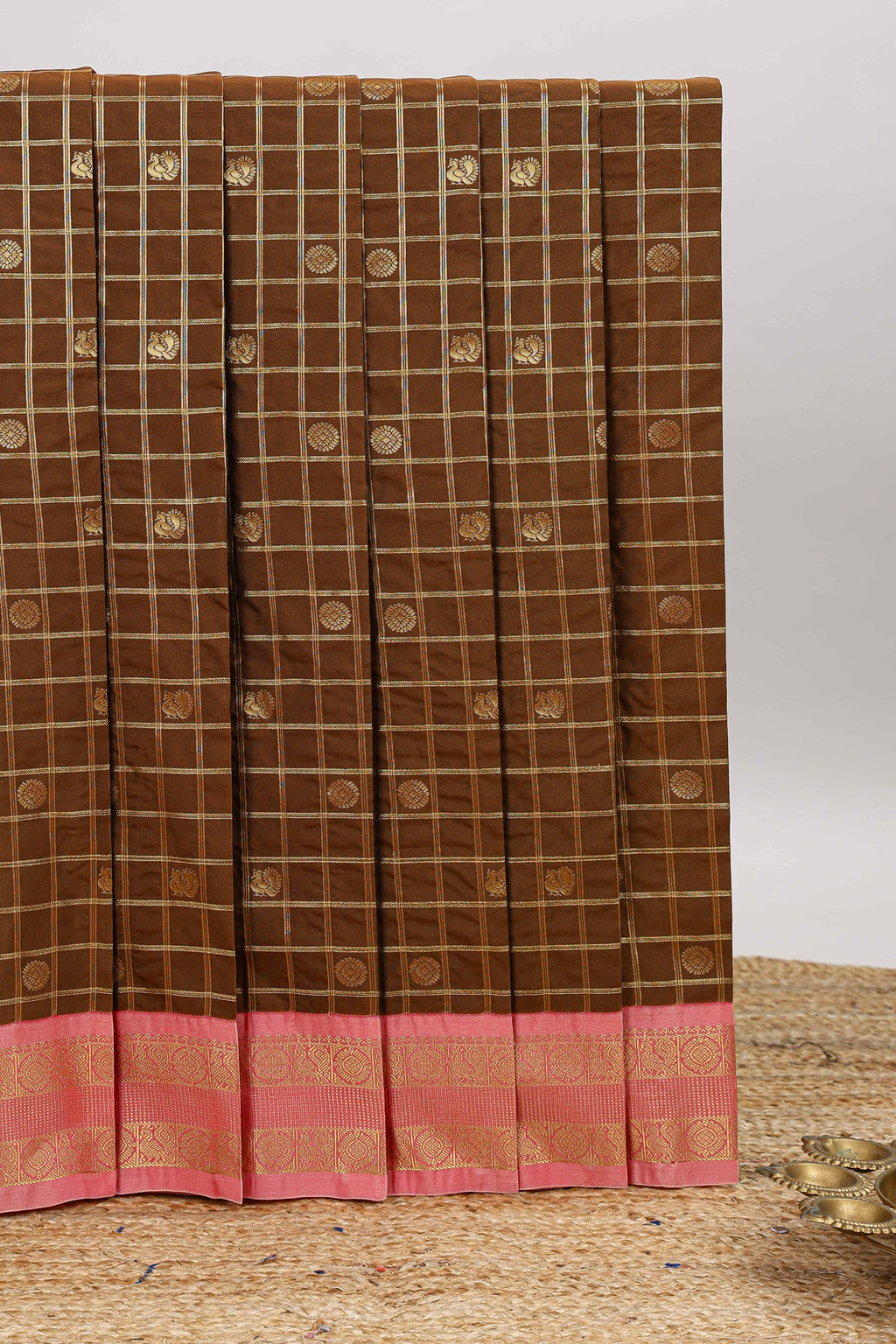 Brown checked zari motifs design art silk saree with contrast border and blouse