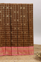 Brown checked zari motifs design art silk saree with contrast border and blouse