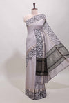 Faded lavender plain assam silk saree eith self ikkat style border and matching blouse