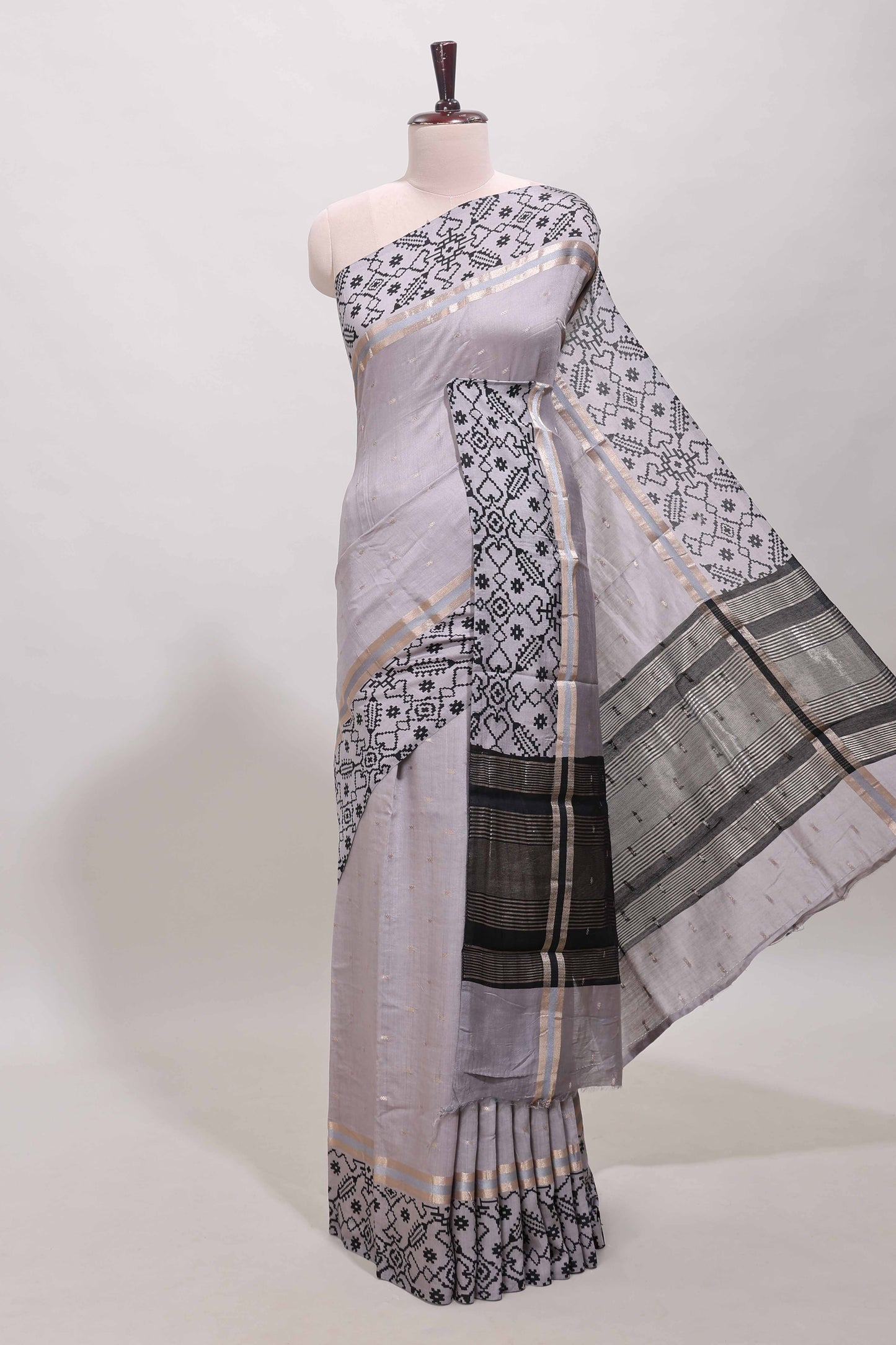 Faded lavender plain assam silk saree eith self ikkat style border and matching blouse
