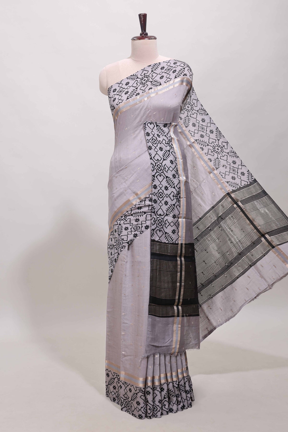 Faded lavender plain assam silk saree eith self ikkat style border and matching blouse