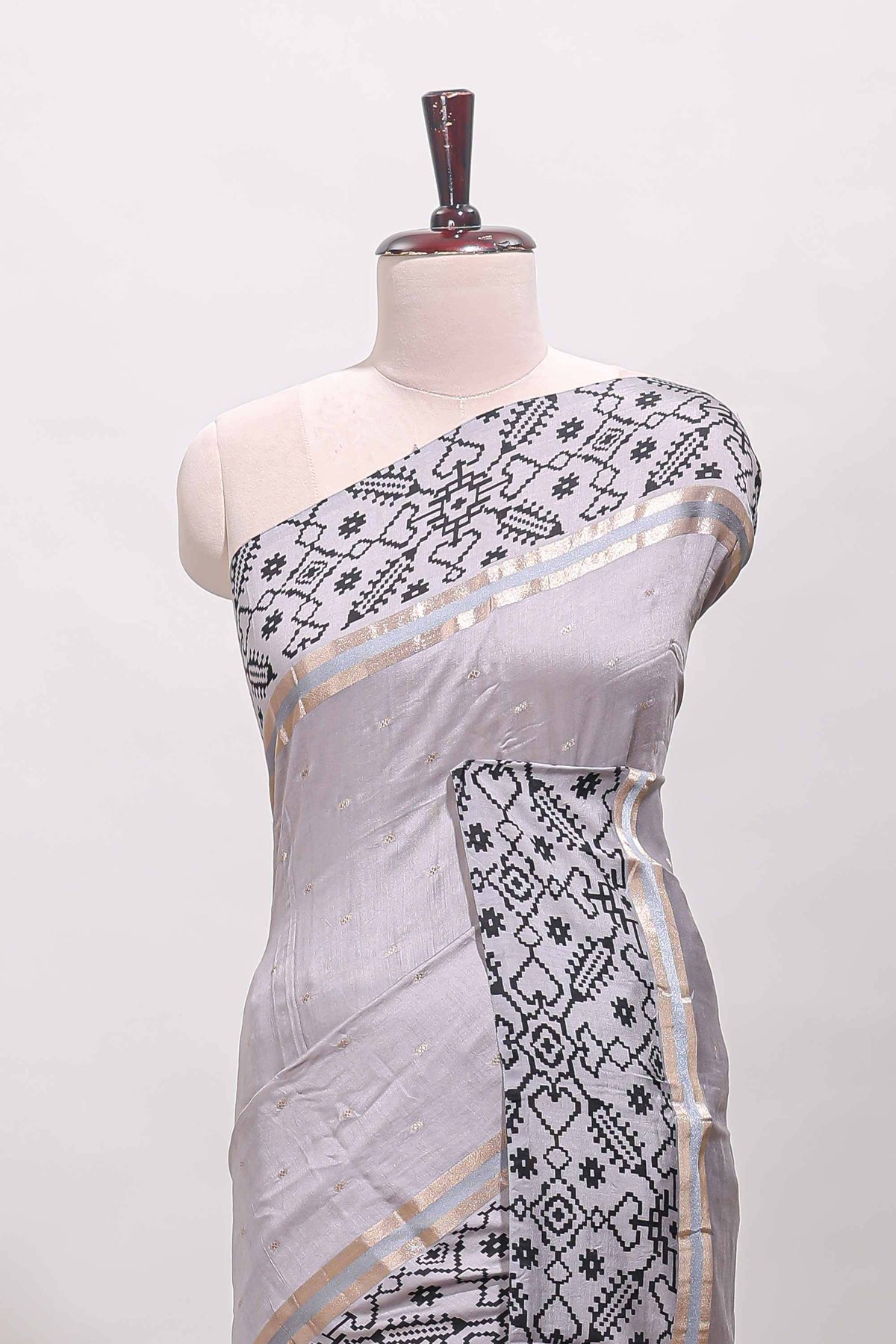 Faded lavender plain assam silk saree eith self ikkat style border and matching blouse