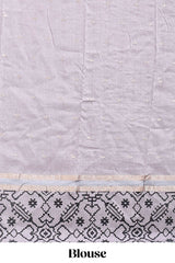 Faded lavender plain assam silk saree eith self ikkat style border and matching blouse