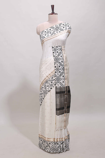 White plain assam silk saree eith self ikkat style border and matching blouse