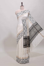 White plain assam silk saree eith self ikkat style border and matching blouse