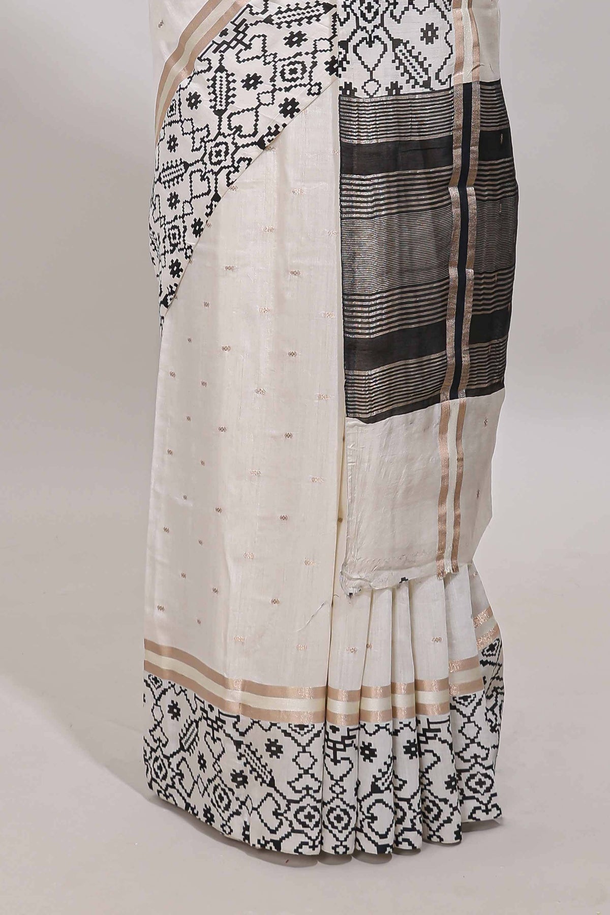 White plain assam silk saree eith self ikkat style border and matching blouse
