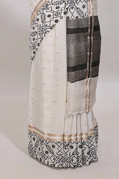 White plain assam silk saree eith self ikkat style border and matching blouse