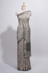 Ivory colour Assam Silk saree traditional folk motif print floral patterns and a contrast woven border The detailed pallu along with contrast blouse