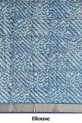 Aqua blue Assam Silk saree with woven patterns floral details contrast navy pallu and zari border along with printed blouse