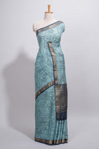 Elegant aqua blue Assam Silk saree abstract floral line motifs subtle woven details contrast pallu and rich zari border and contrast blouse