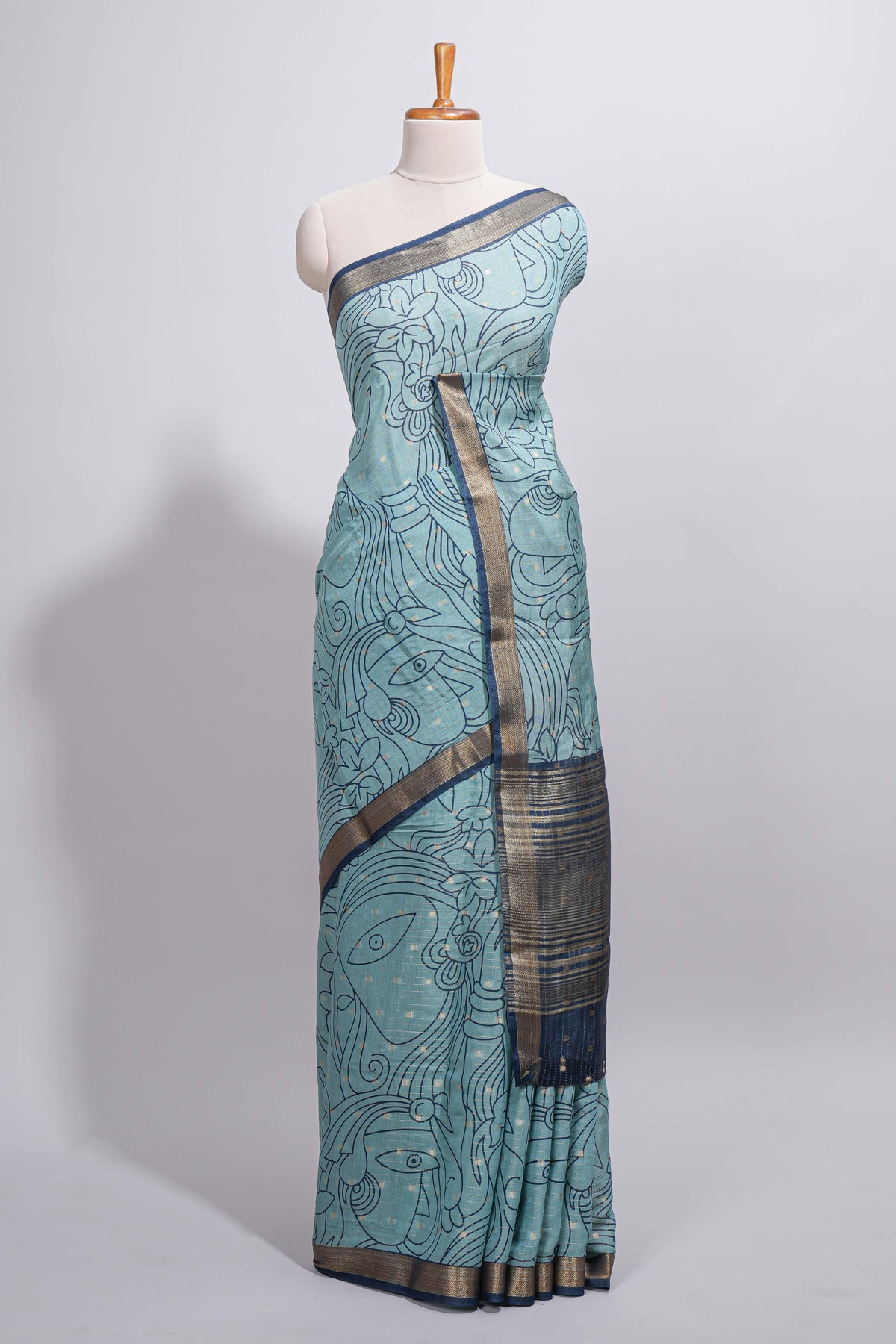 Elegant aqua blue Assam Silk saree abstract floral line motifs subtle woven details contrast pallu and rich zari border and contrast blouse