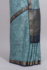Elegant aqua blue Assam Silk saree abstract floral line motifs subtle woven details contrast pallu and rich zari border and contrast blouse