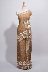 BrownAssam silk saree self-check body with small woven butta motifs and elegant white floral vine prints with zari border along with matching blouse