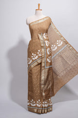 BrownAssam silk saree self-check body with small woven butta motifs and elegant white floral vine prints with zari border along with matching blouse