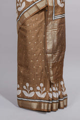 BrownAssam silk saree self-check body with small woven butta motifs and elegant white floral vine prints with zari border along with matching blouse