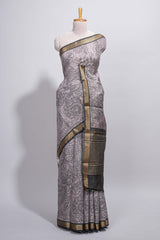 Elegant Grey Assam Silk saree with floral vine motifs detailed woven patterns contrastpallu and zari border alond with contrast blouse