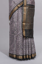 Elegant Grey Assam Silk saree with floral vine motifs detailed woven patterns contrast  pallu and zari border alond with contrast blouse