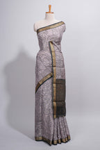 Grey Assam Silk saree abstract floral line motifs subtle woven details contrast pallu and rich zari border and contrast blouse