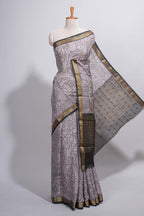 Grey Assam Silk saree abstract floral line motifs subtle woven details contrast pallu and rich zari border and contrast blouse