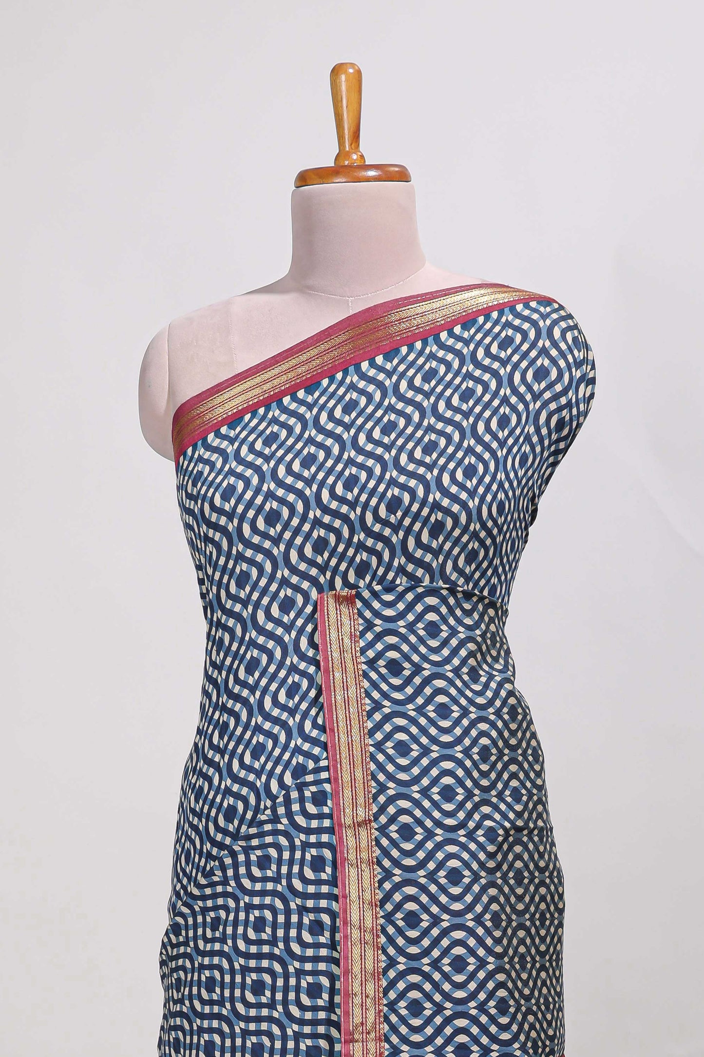 navy blue geometric print  assam silk saree with  zari border and matching blouse