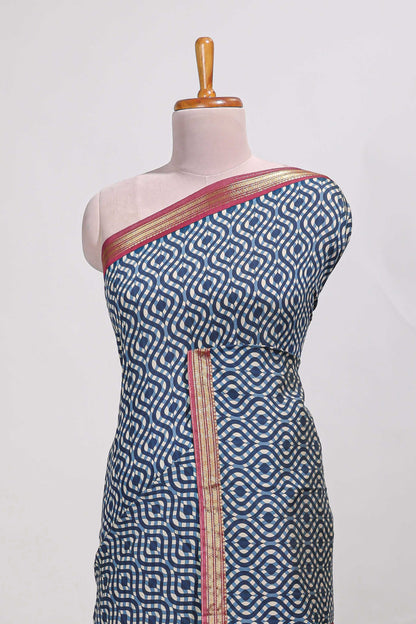 navy blue geometric print  assam silk saree with  zari border and matching blouse